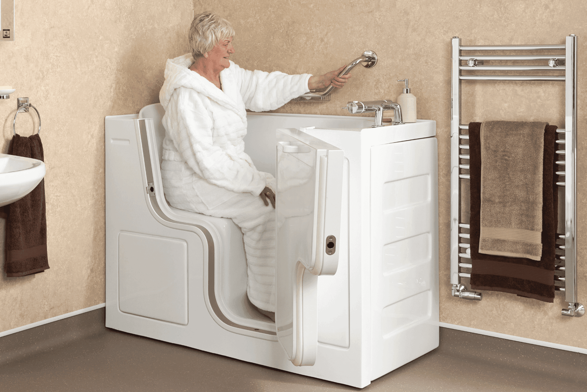 Serenity walk-in bath with ergonomic ramped seat, shown in cutaway detail