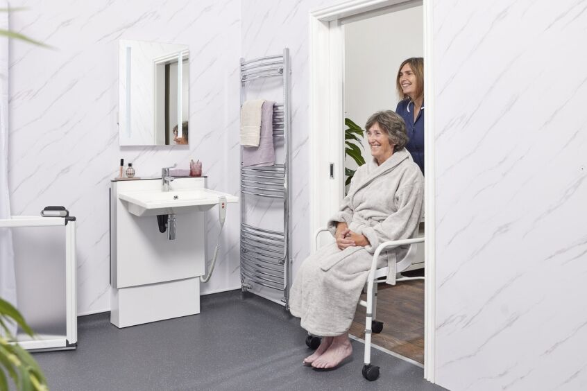 Pocket door for wheelchair accessible bathroom