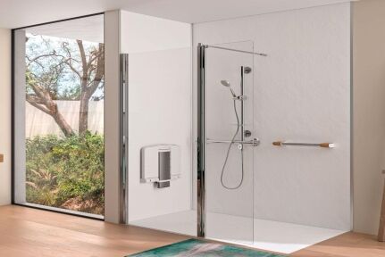 Assisted bathing shower with anti-slip flooring, anti-scald controls and grab rails