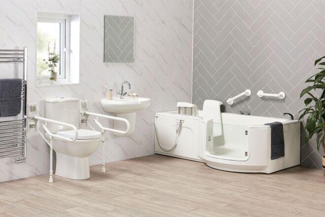 Wolferton P-shaped shower bath with powered seat and glass shower screen.