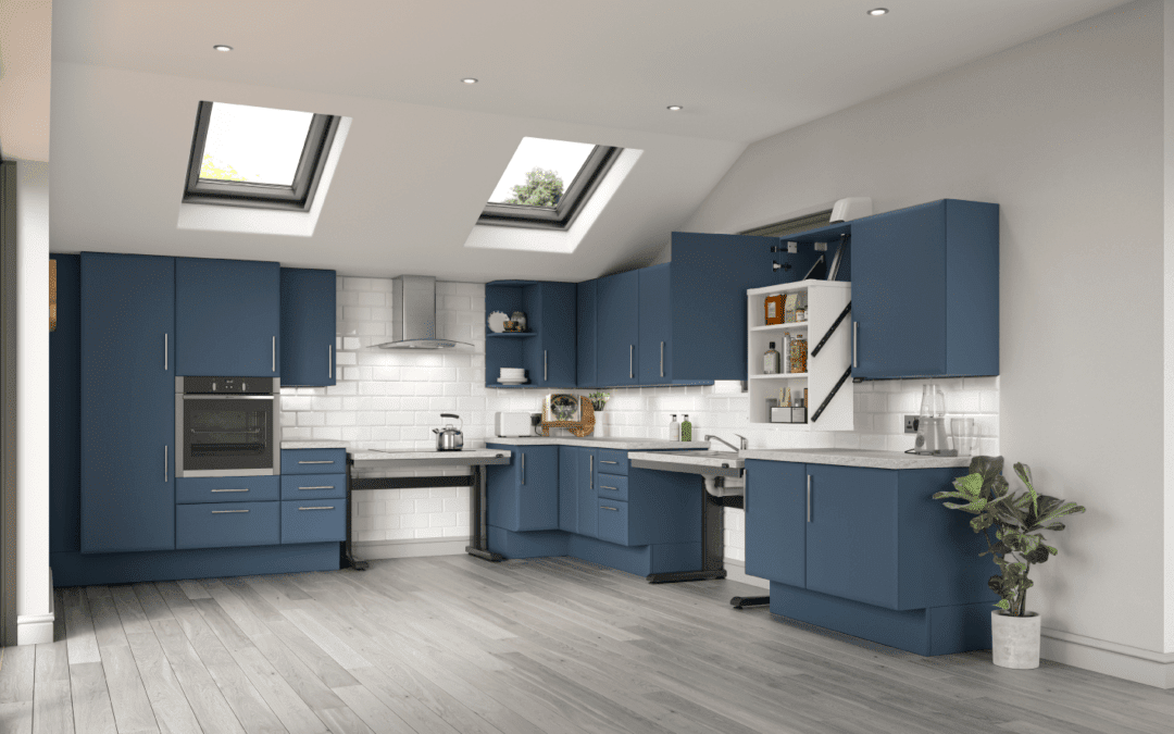 Kitchen designer discussing accessible kitchen layout with a client in a modern kitchen setting.