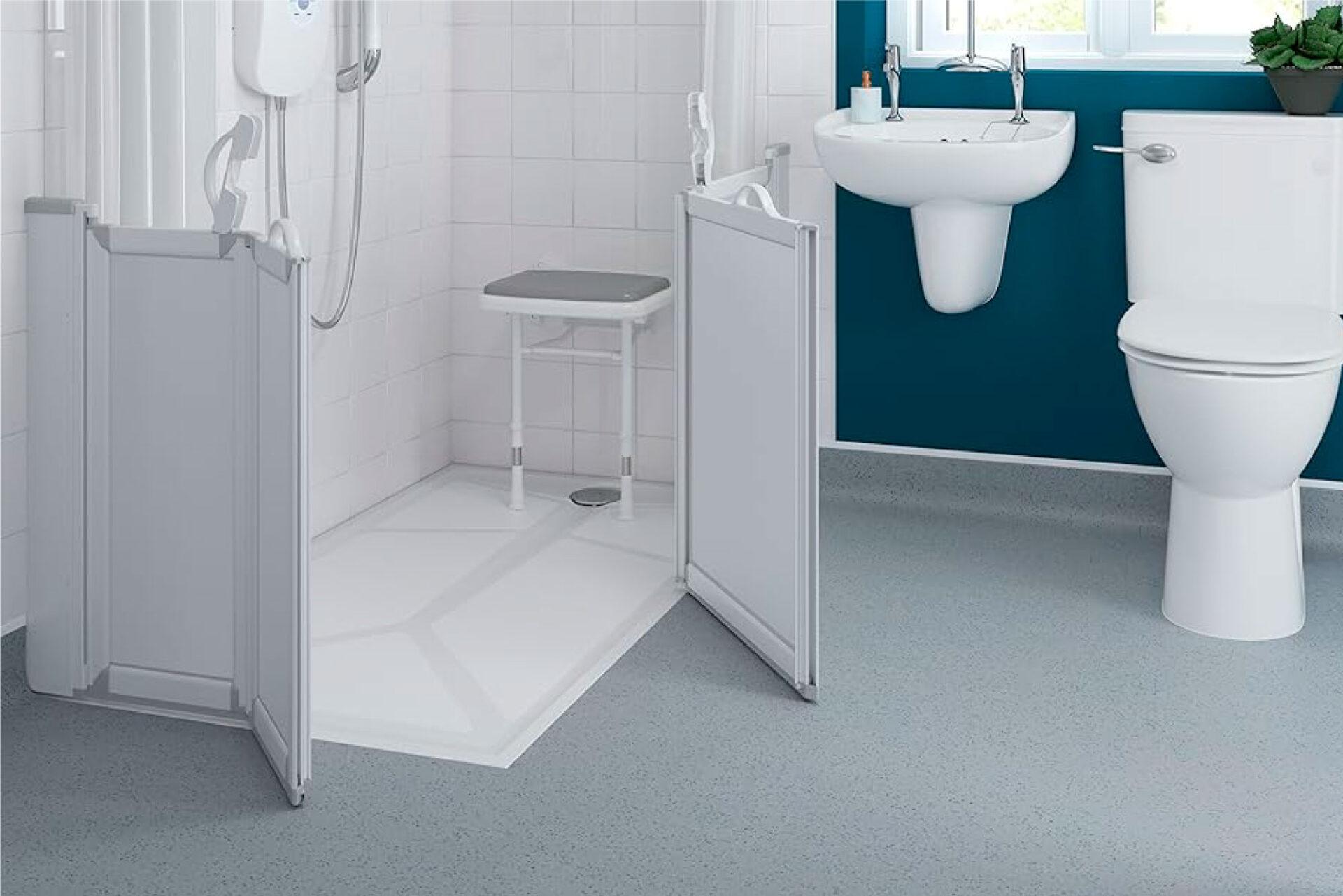 Spacious assisted bathing shower with foldable seat allowing caregiver access