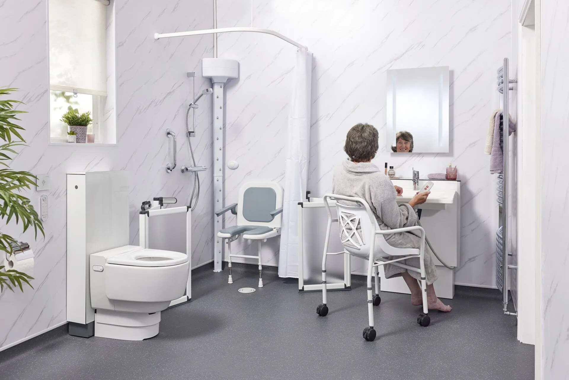 Wheelchair accessible wet room with wide turning space, body dryer and wash and dry toilet