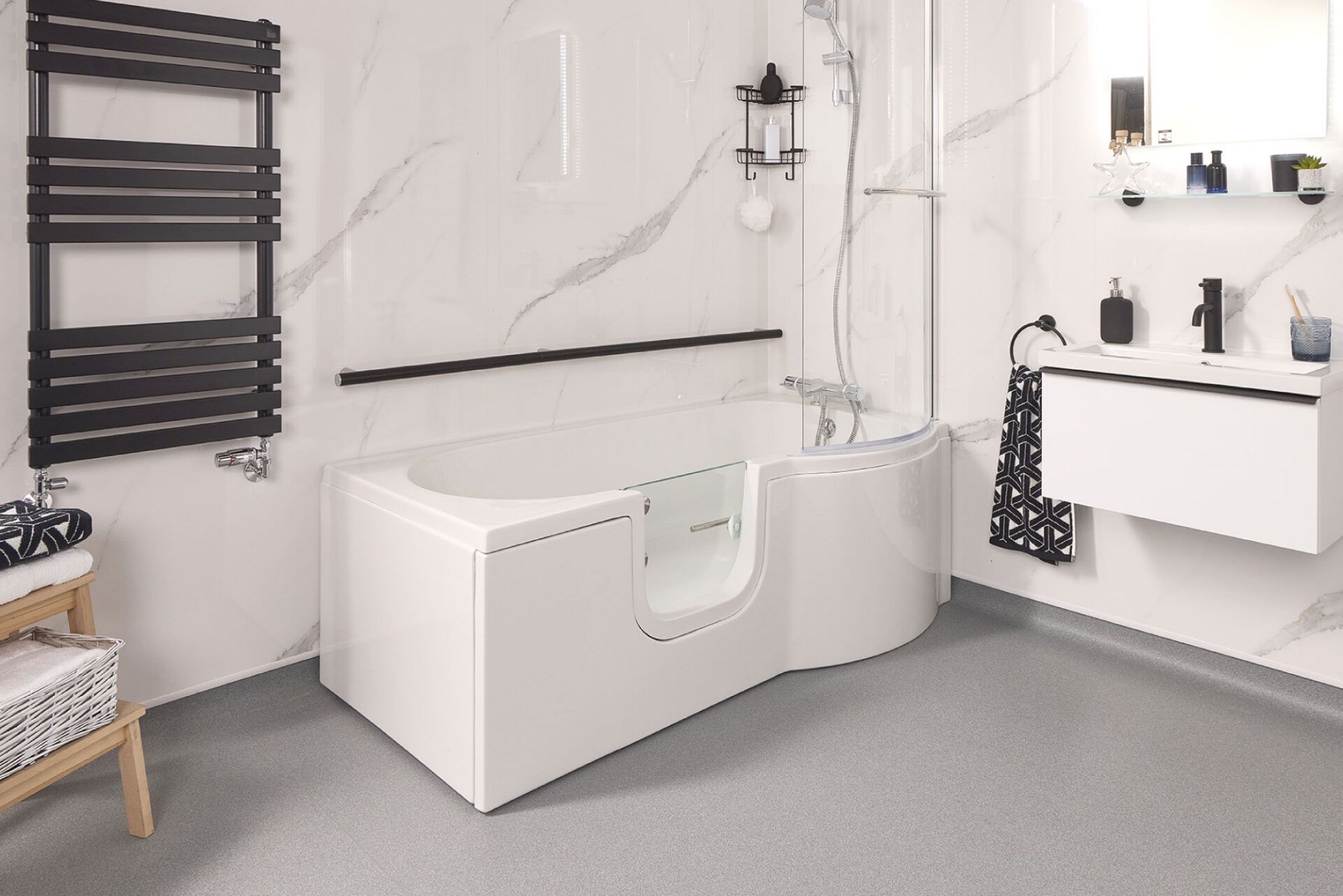 Modern easy access bath installed in a UK bathroom, showing a lower rim height for safer stepping in
