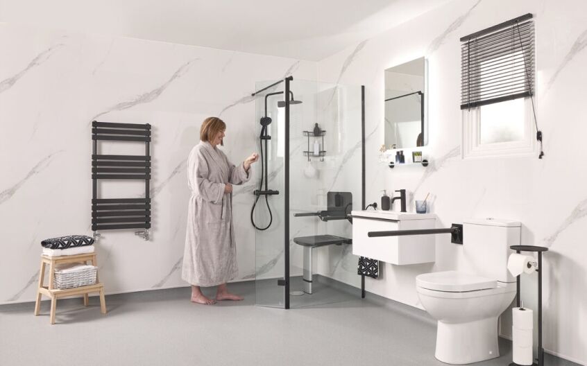 Modern wet room bathroom with level access floor replacing standard bath