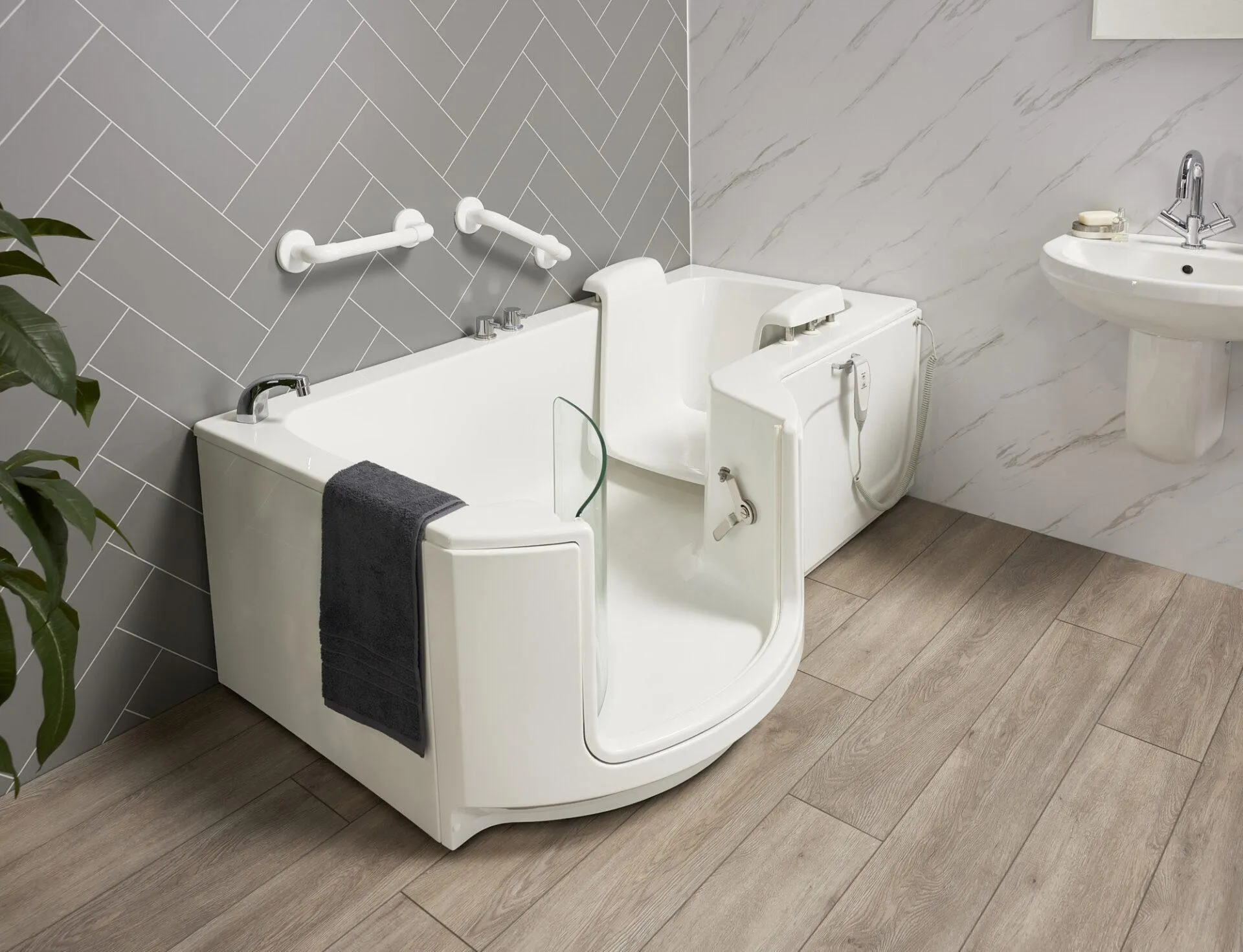 Walk-in bath with built-in seat and thermostatic controls