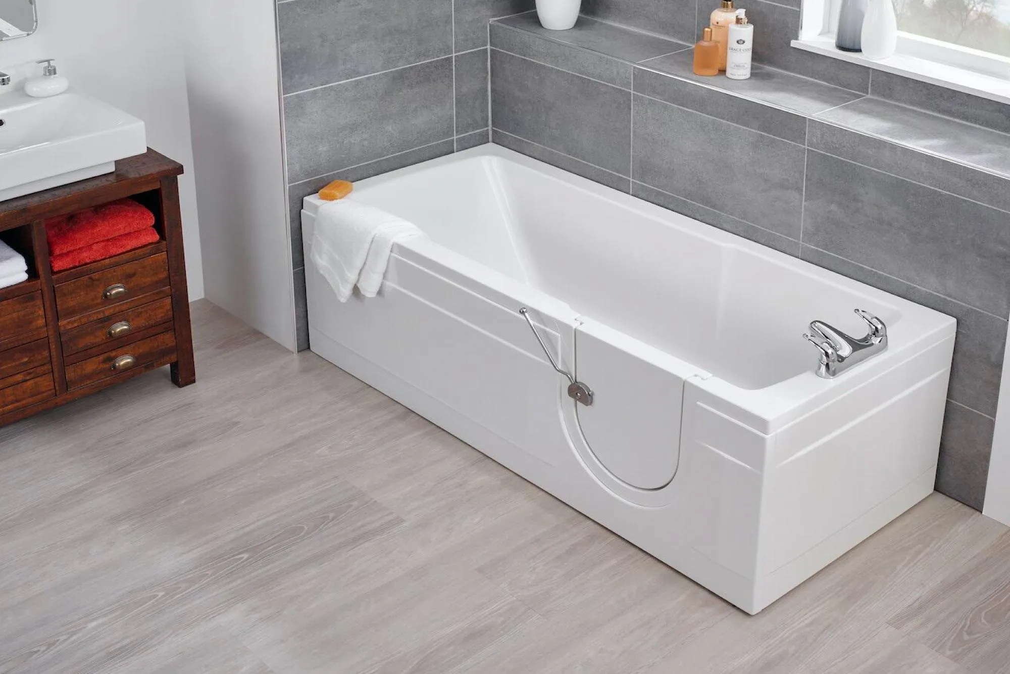 Full-length walk-in bath with low-entry door, installed by EA Mobility