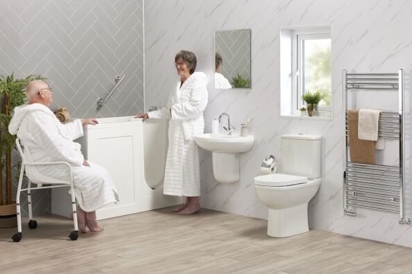 A modern bathroom featuring compact bathing solutions designed for space efficiency and accessibility.