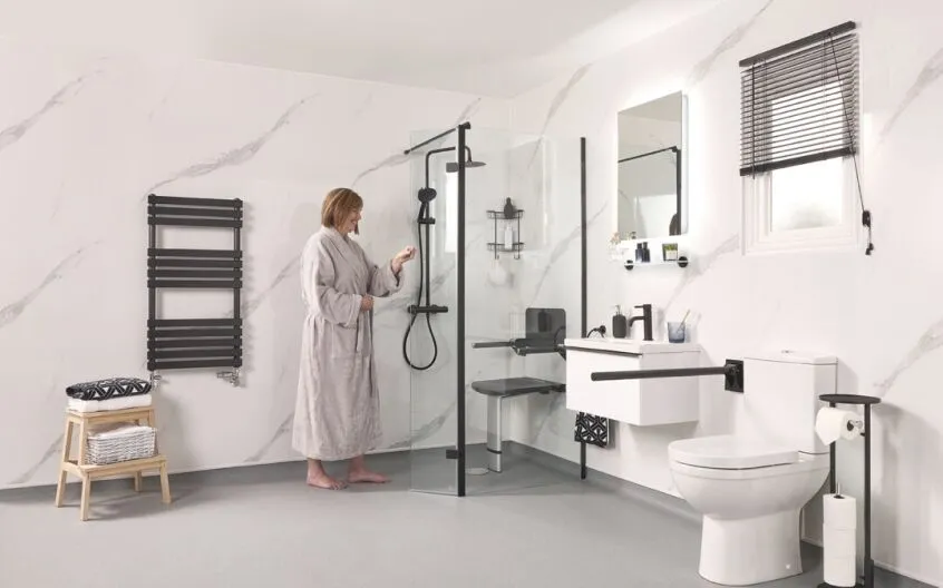 Modern wet room bathroom with level access floor replacing standard bath
