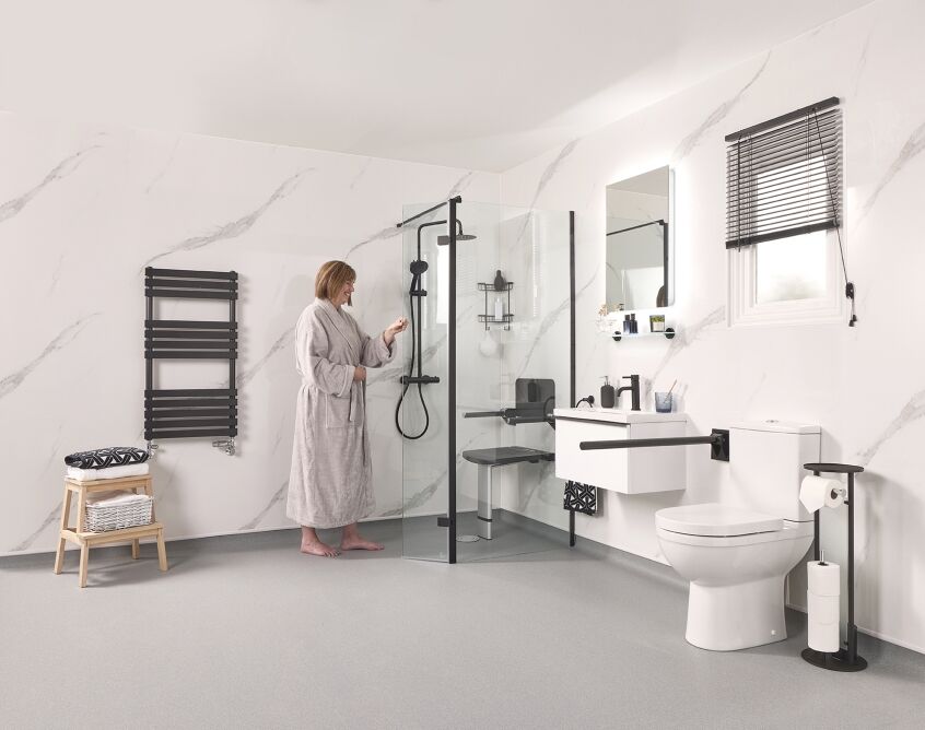 Modern accessible wet room with a level-access floor installed in place of a standard bath