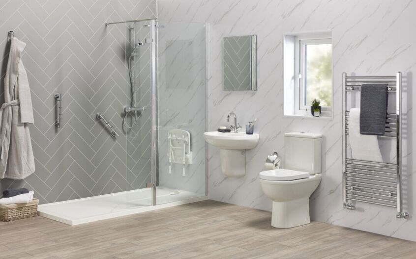 Modern level access shower tray with stylish black fixtures for accessible bathroom