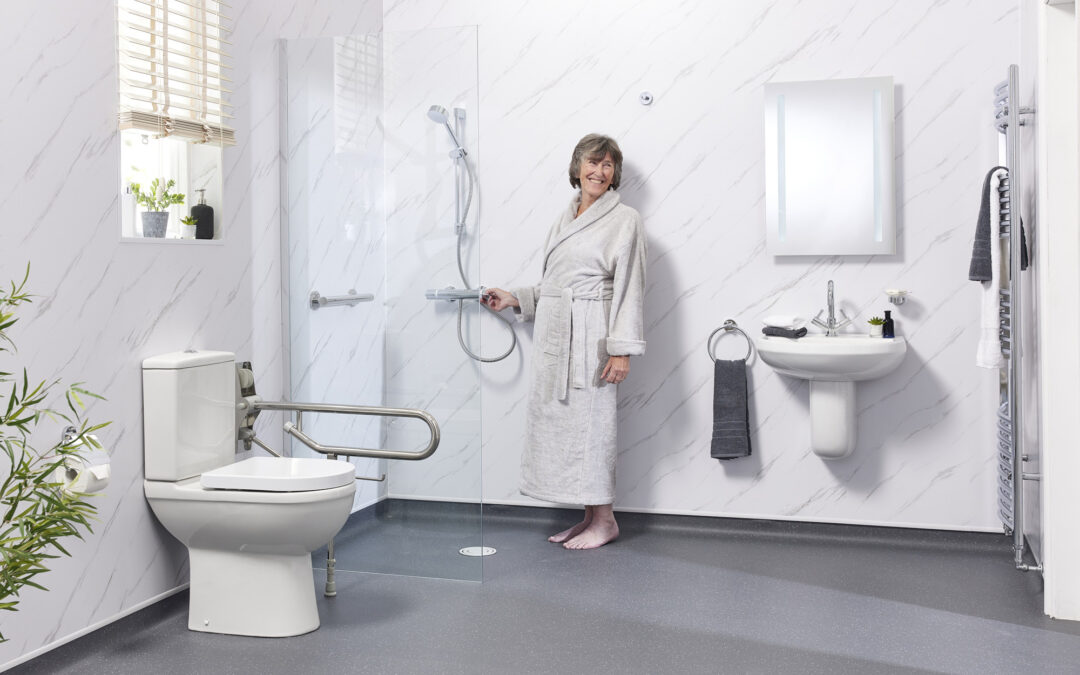 Spotless modern disabled wet room with clean glass screen and safety flooring