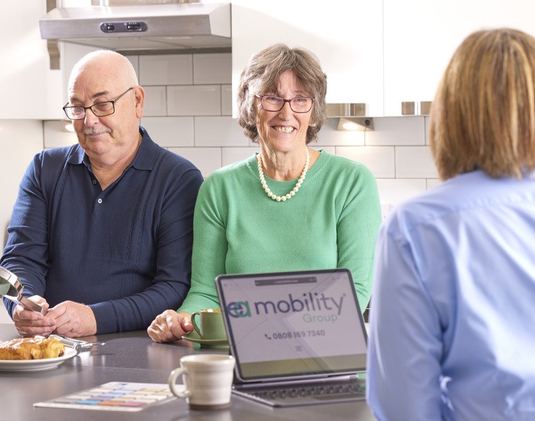 Free No-Obligation Home Visit Image of a friendly consultant during a home visit to discuss accessible bathroom solutions.