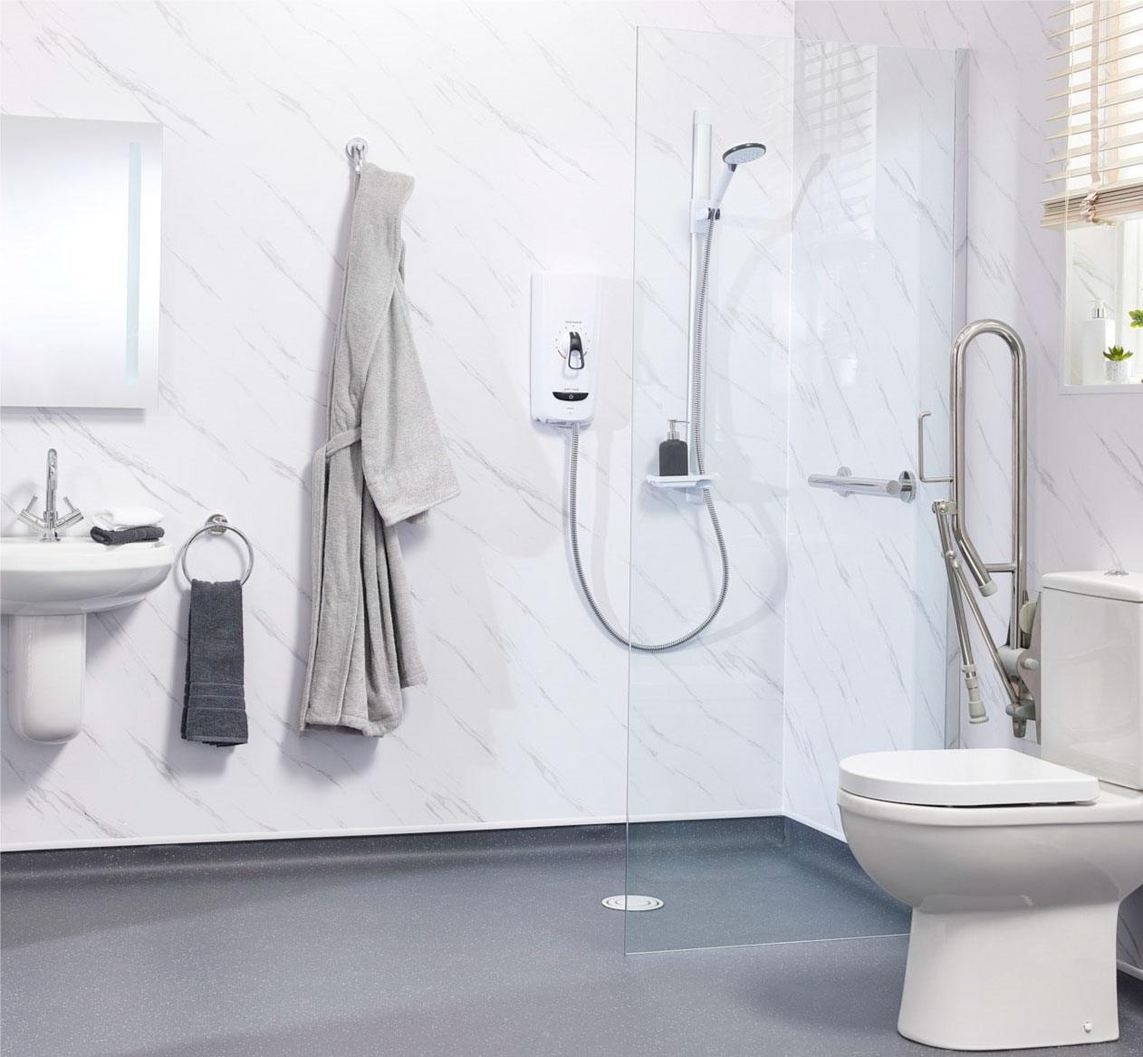 A compact wet-room with a level-access shower, fold-down seat, grab rails, and slip-resistant flooring, designed to maximise space.