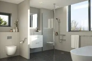 Chrome grab bars and fold-down seats in a stylish disabled wet room