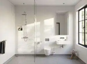 Natural light flooding a disabled wet room with frosted glass