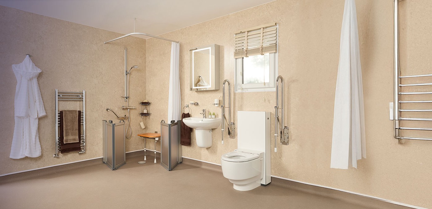 A spacious, modern wet room with level access, slip-resistant flooring, and integrated safety features like grab rails and a shower seat.