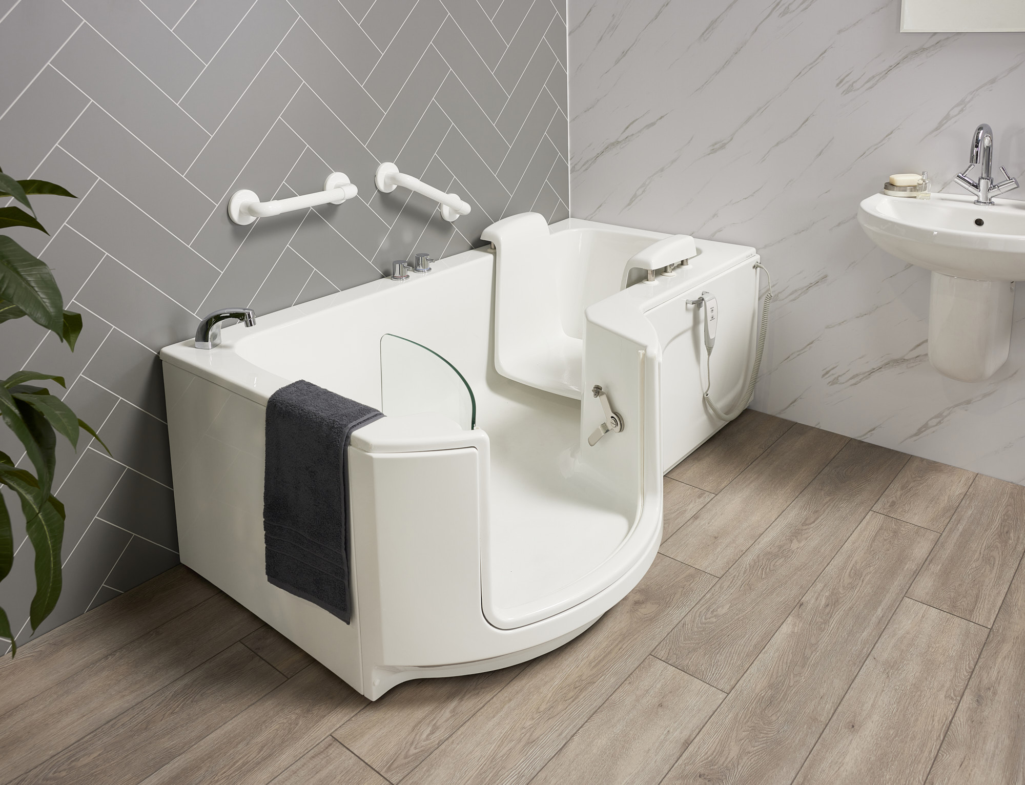 Safety grab rail installed next to power bath-lift walk-in bath