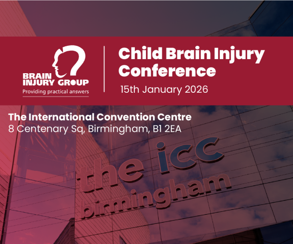 Older woman in bathrobe standing beside level-access shower with fold-down seat, grab rails, and anti-slip blue flooring in accessible bathroom