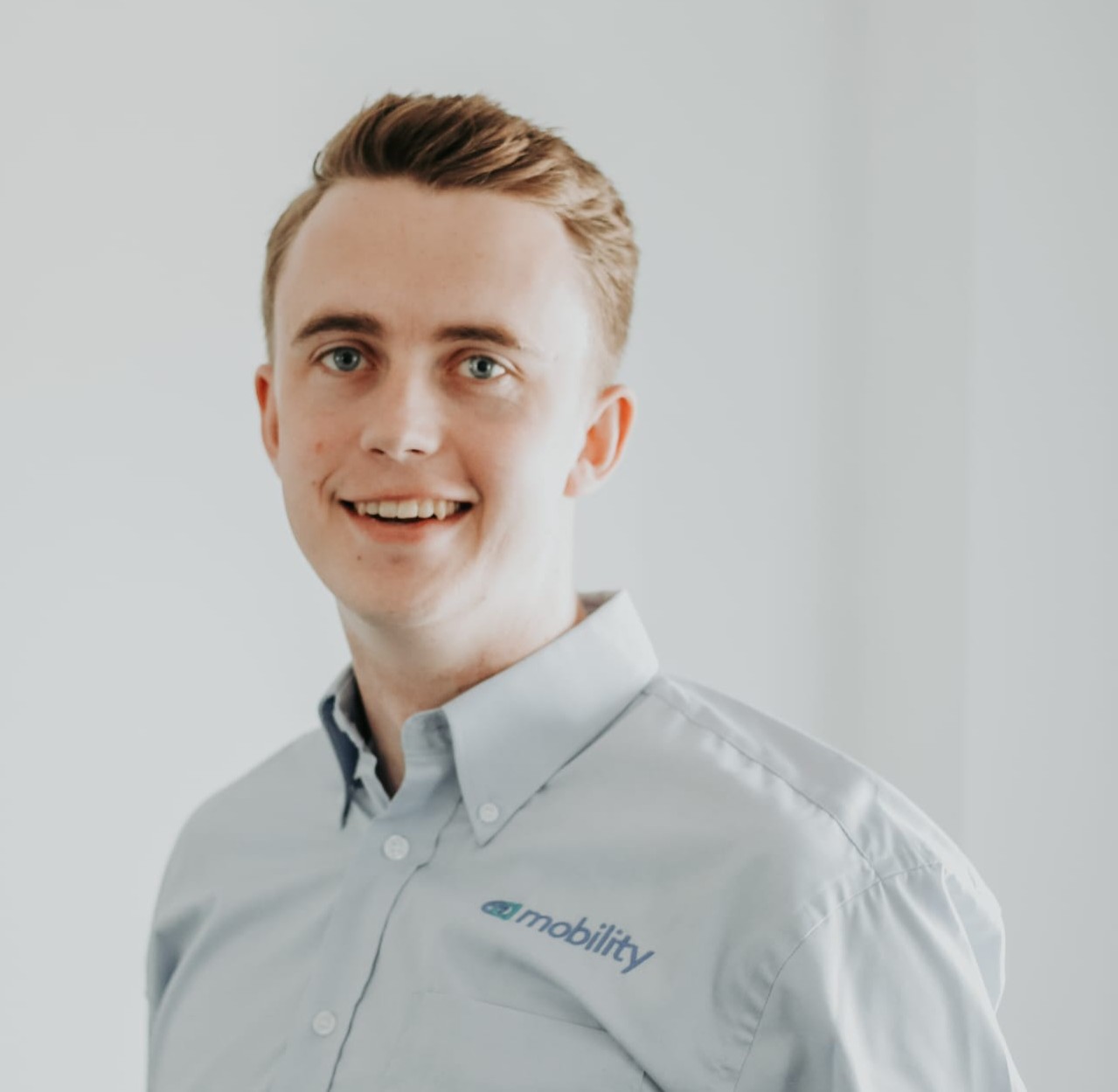 Kevin Carvell, Founder and Managing Director of EA Mobility, smiling in a professional setting.