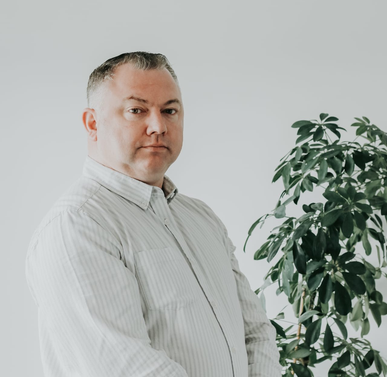 Kevin Carvell, Founder and Managing Director of EA Mobility, smiling in a professional setting.