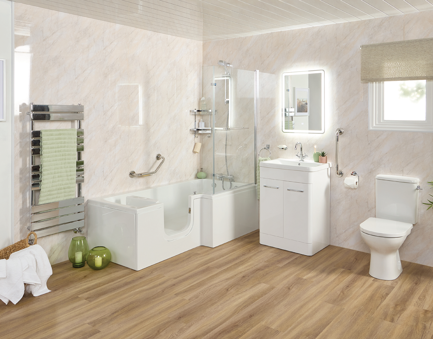 Walk-in bath with low-entry door, built-in seat and safety handrails installed by EA Mobility across East Anglia