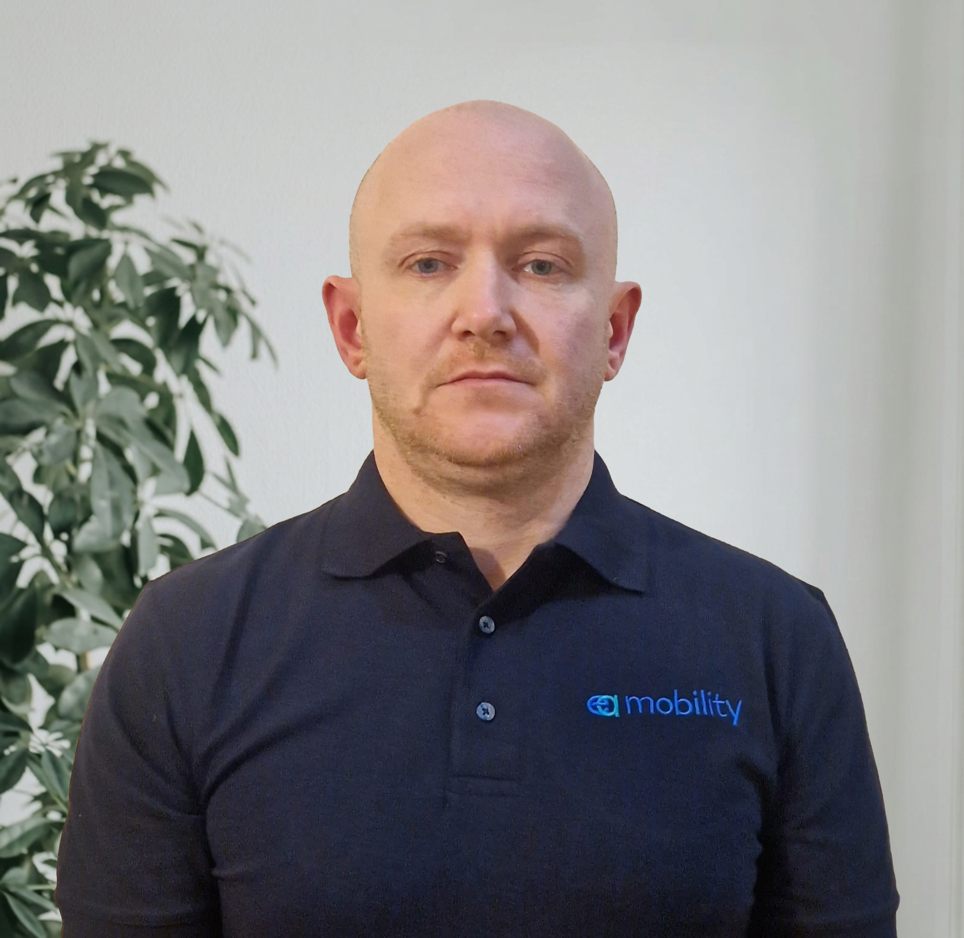 Kevin Carvell, Founder and Managing Director of EA Mobility, smiling in a professional setting.