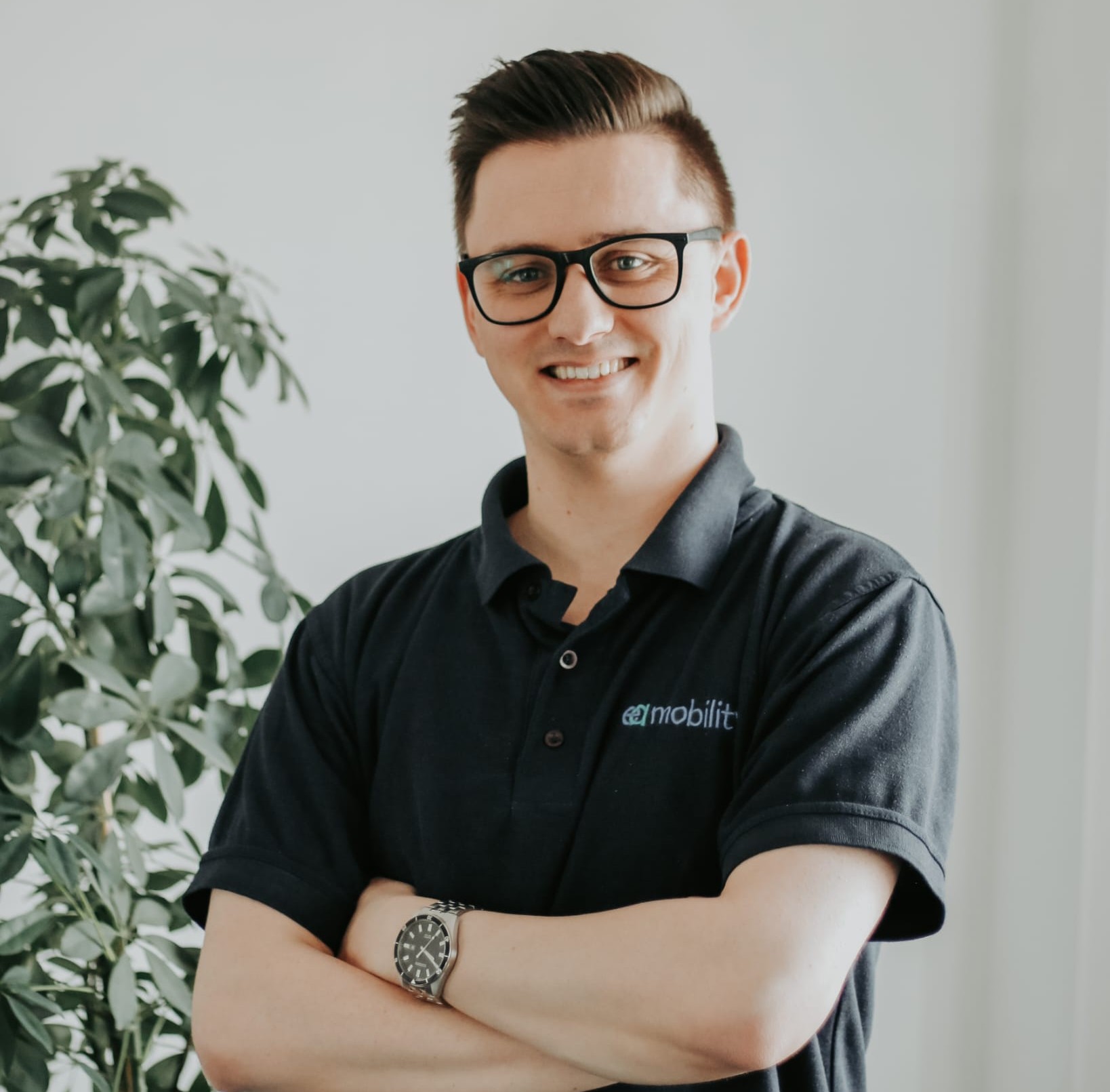 Kevin Carvell, Founder and Managing Director of EA Mobility, smiling in a professional setting.