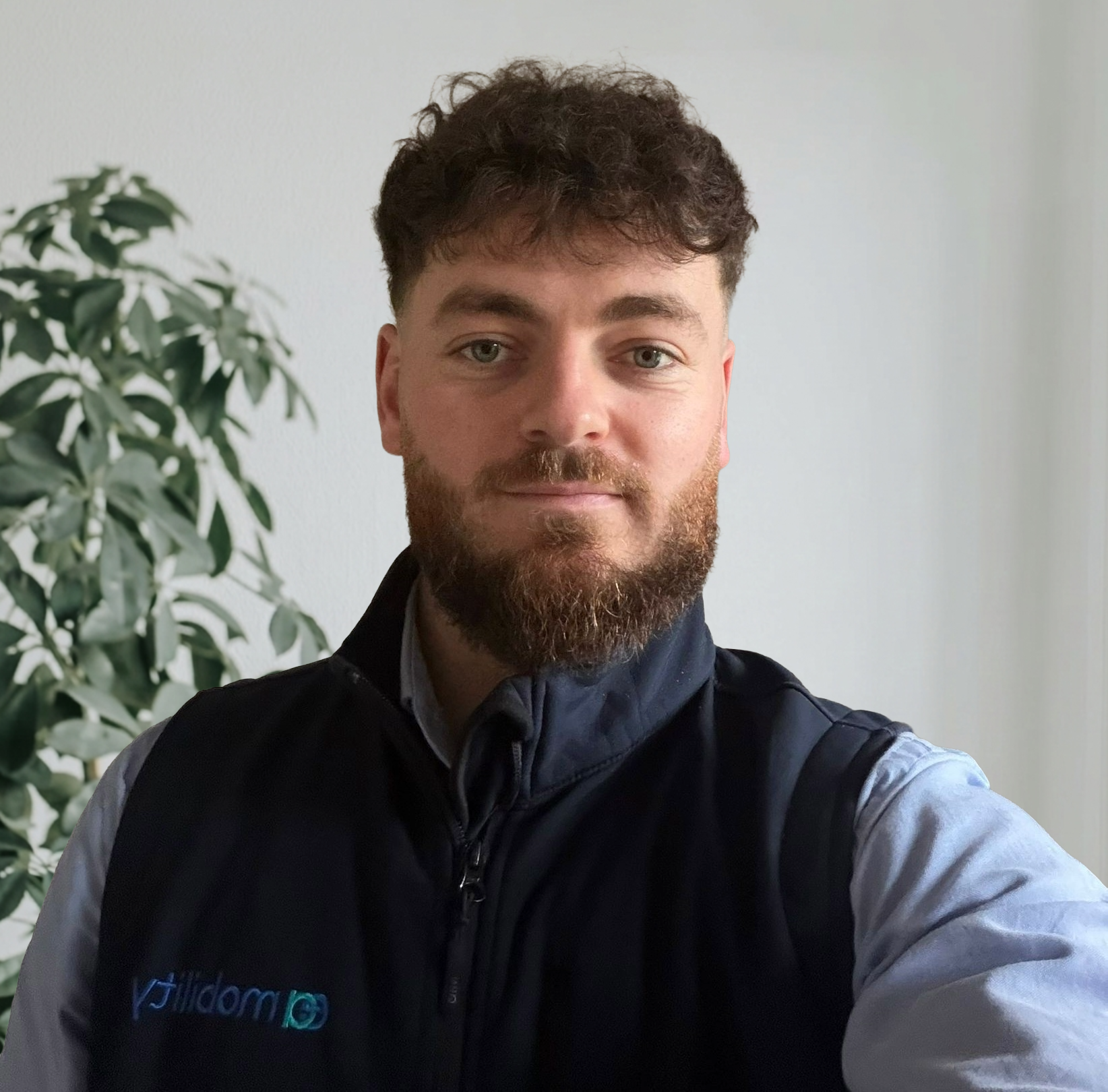 Kevin Carvell, Founder and Managing Director of EA Mobility, smiling in a professional setting.