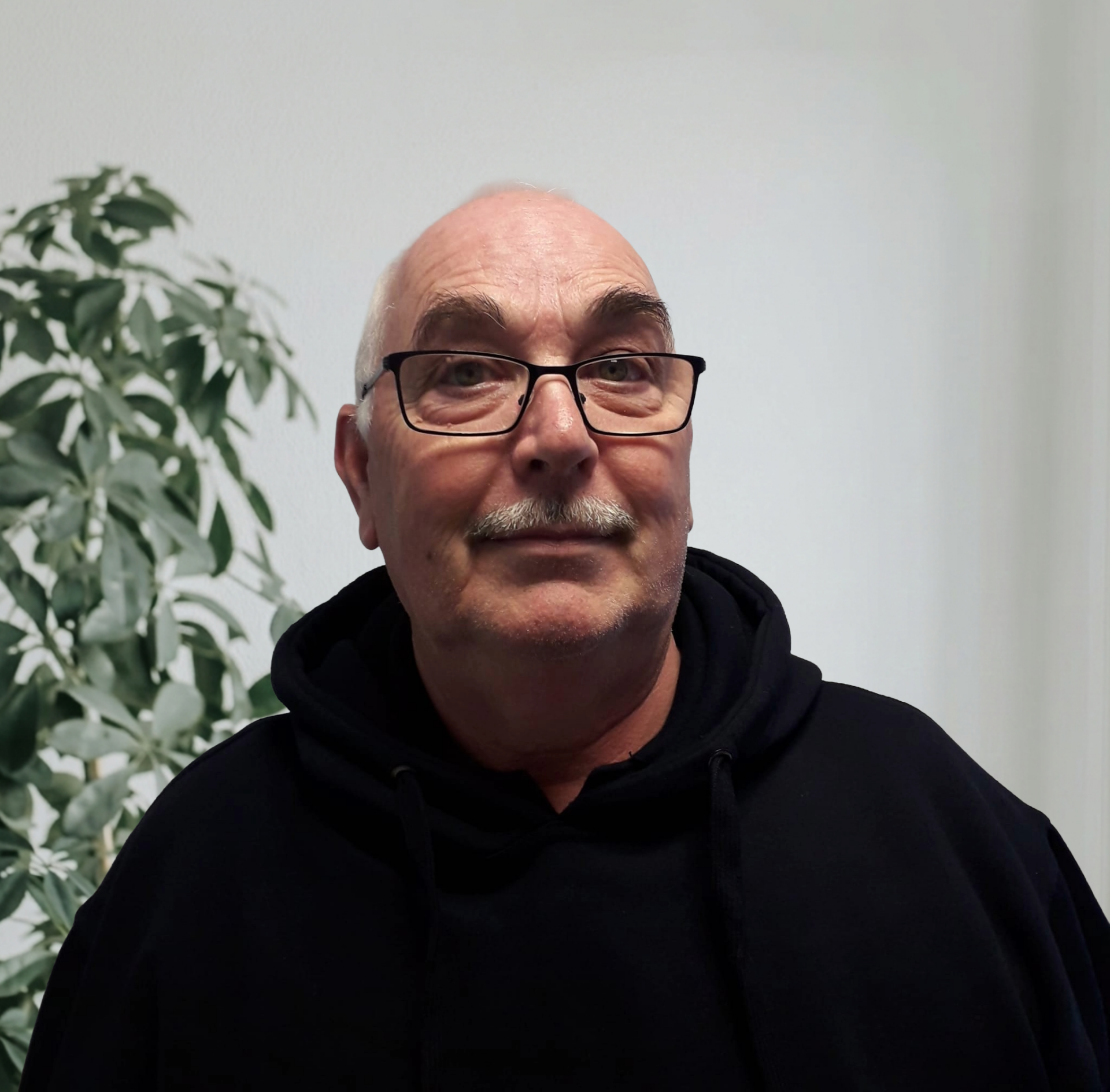 Kevin Carvell, Founder and Managing Director of EA Mobility, smiling in a professional setting.