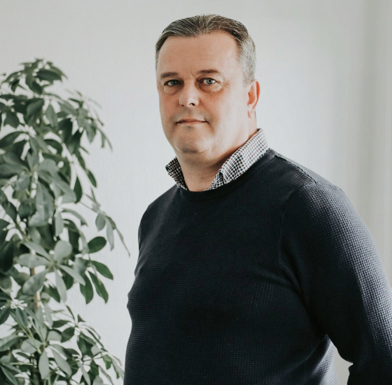 Kevin Carvell, Founder and Managing Director of EA Mobility, smiling in a professional setting.