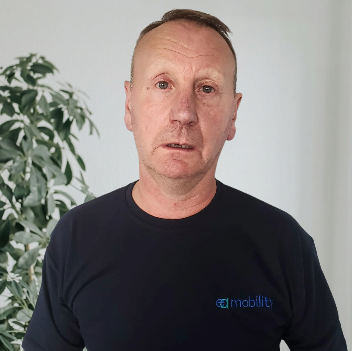 Kevin Carvell, Founder and Managing Director of EA Mobility, smiling in a professional setting.