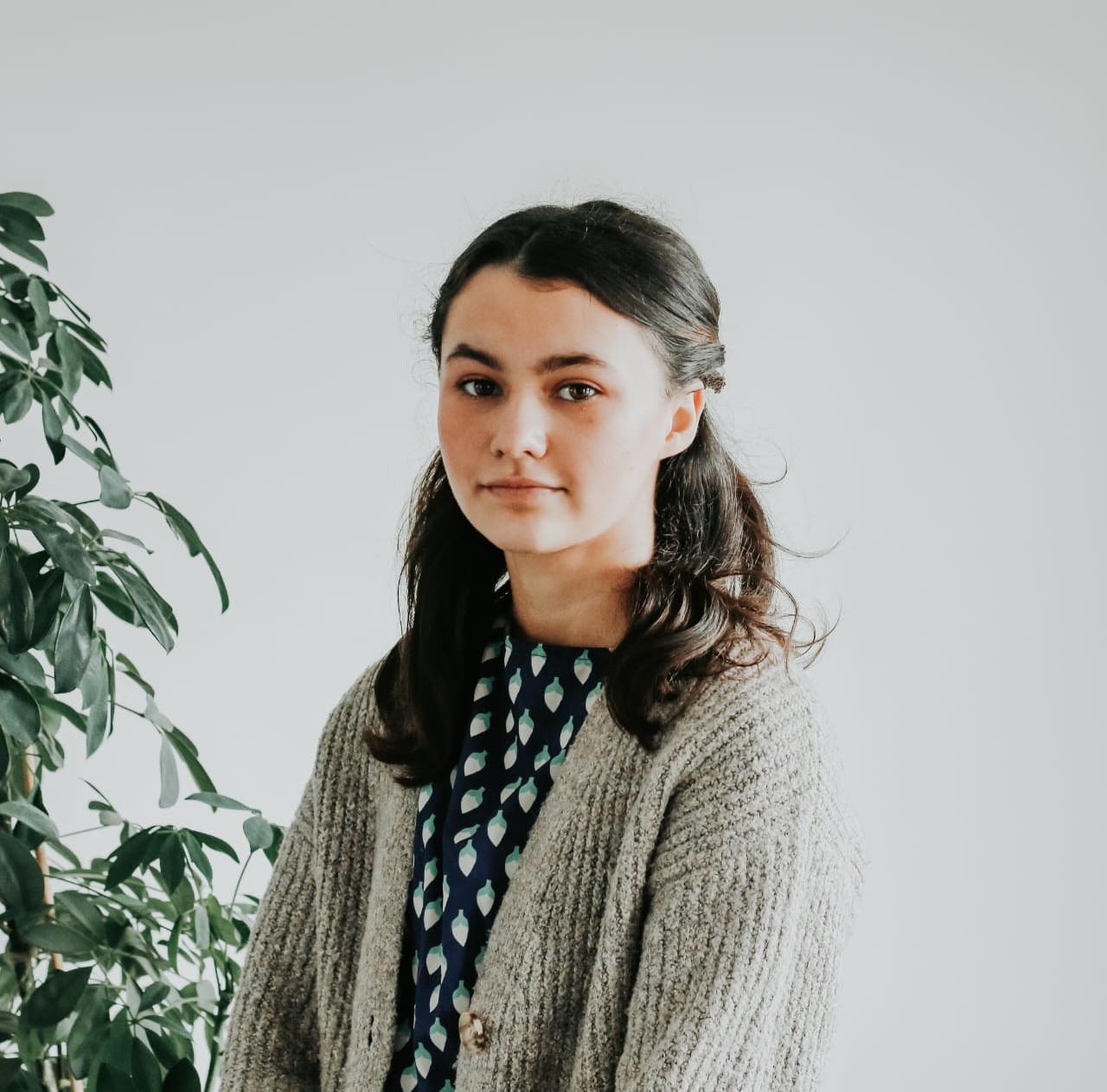 EA Mobility team member wearing light blue shirt in professional headshot
