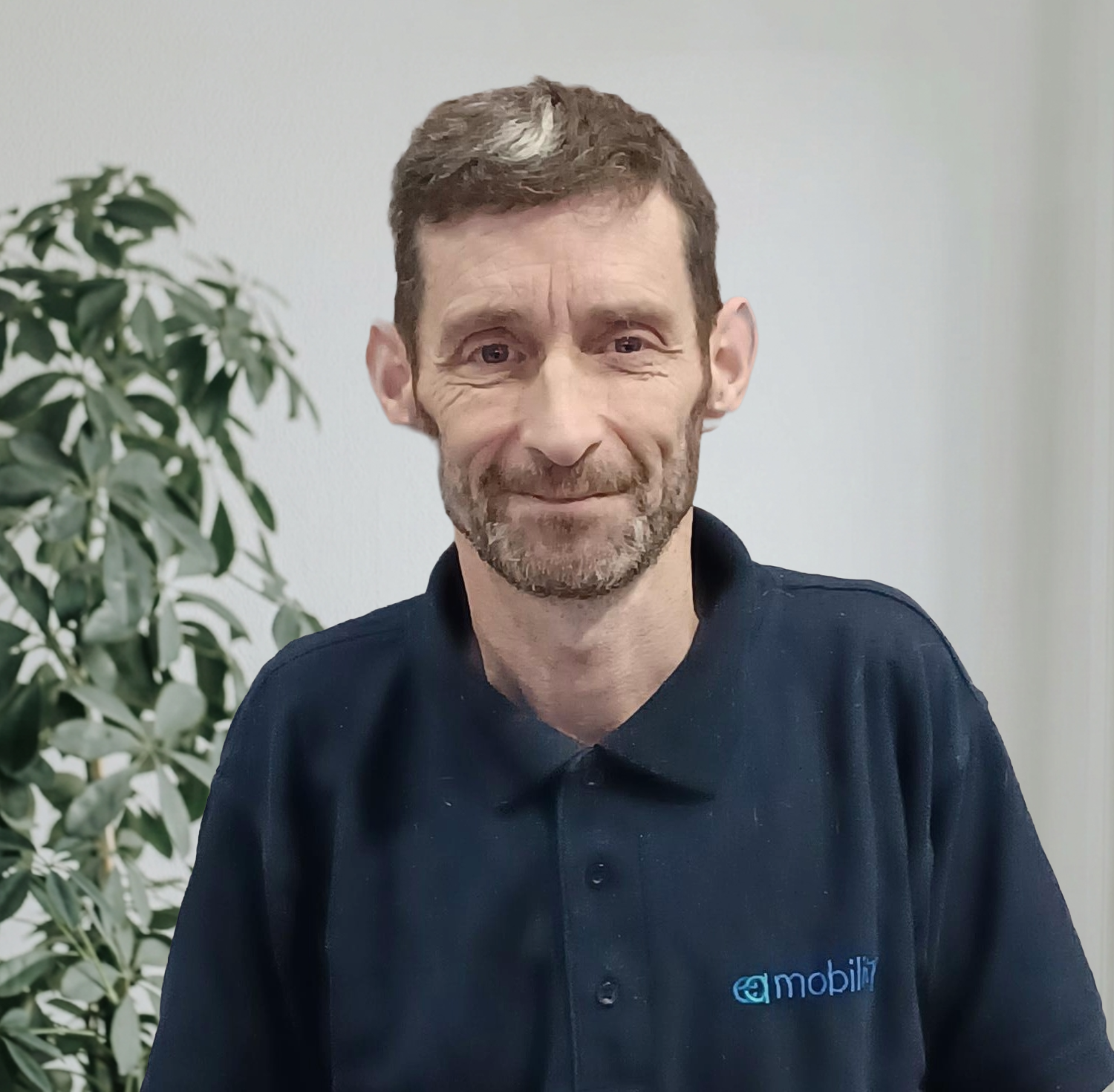 Kevin Carvell, Founder and Managing Director of EA Mobility, smiling in a professional setting.