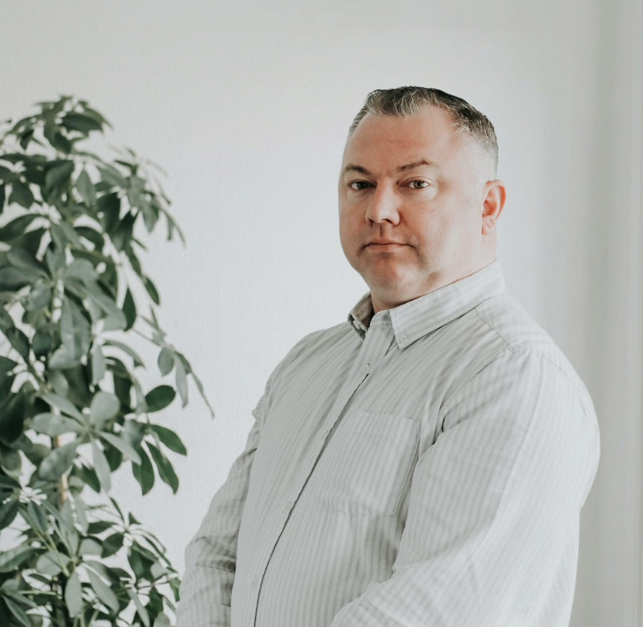 Kevin Carvell, Founder and Managing Director of EA Mobility, smiling in a professional setting.