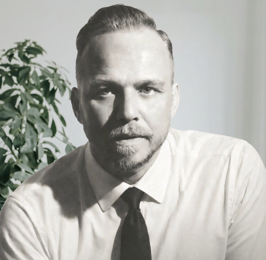 Kevin Carvell, Founder and Managing Director of EA Mobility, smiling in a professional setting.