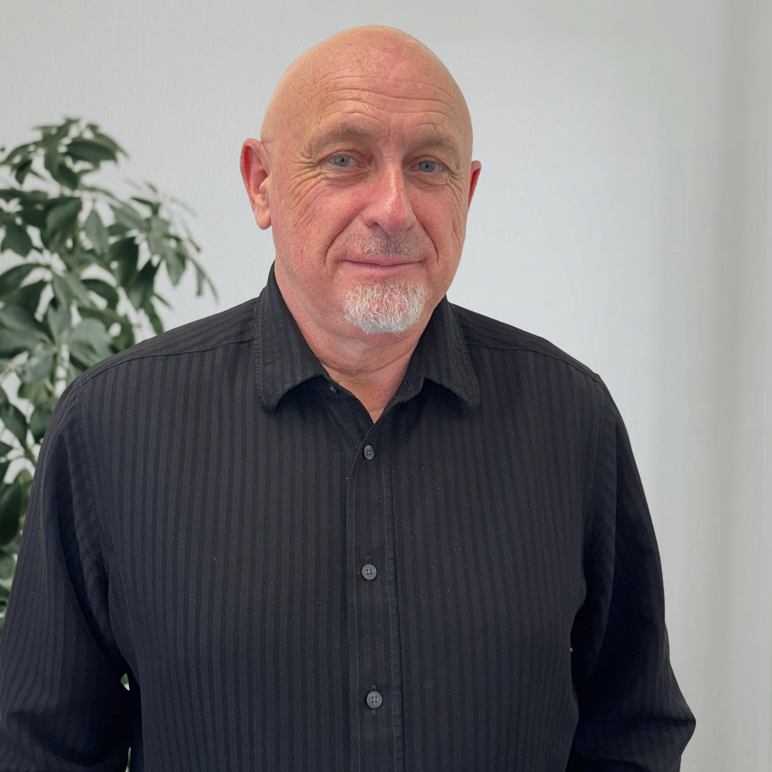 Kevin Carvell, Founder and Managing Director of EA Mobility, smiling in a professional setting.